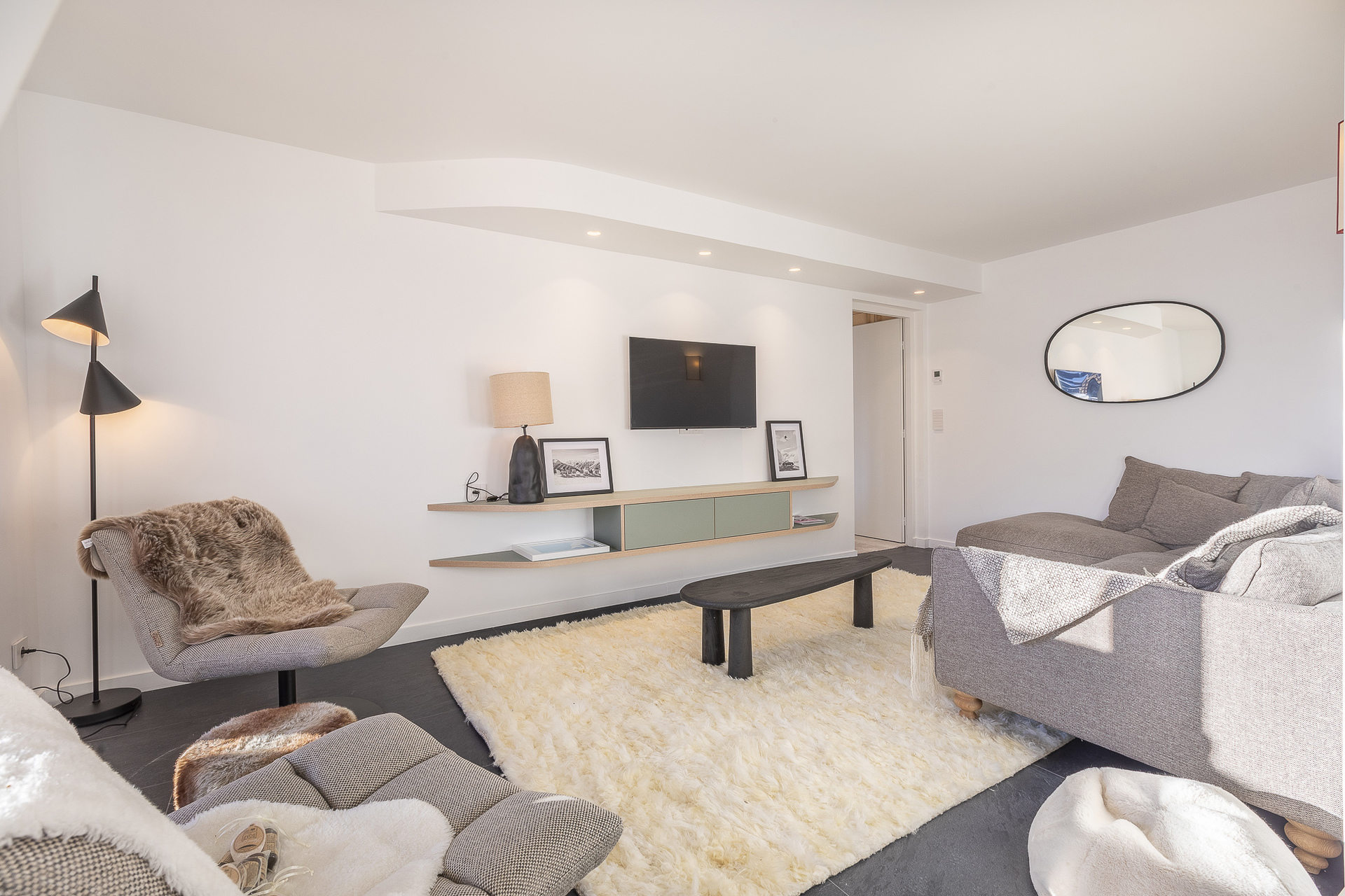 Bright lounge with cream sofas and TV in Apartment Elinka, Avoriaz