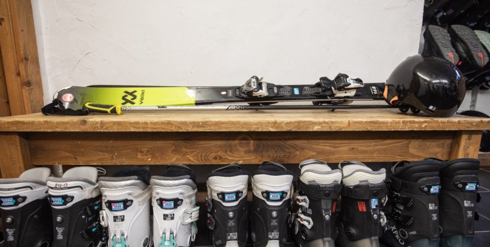 Boot room in catered chalet with Doorstep Ski hire skis and hire boots