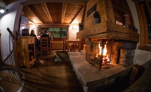 cosy fire in catered alpine chalet