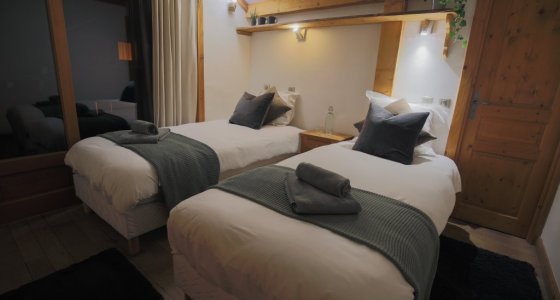 Atlas Sky Apartment twin room catered accommodation morzine.jpg