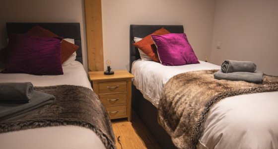 self catered twin ski apartment room.jpg