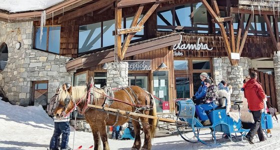 Horse-drawn sleigh outside Hotel Belambra in car-free Avoriaz