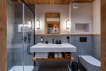Shower room with glass shower, double basin and wall niche in Apartment Le Stade, Morzine