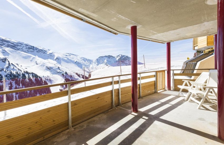 Snowy view from the balcony of a ski apartment in Avoriaz